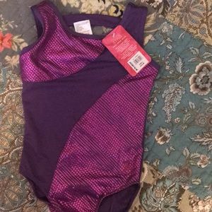 New with tag. Purple leotard. Size xs mall